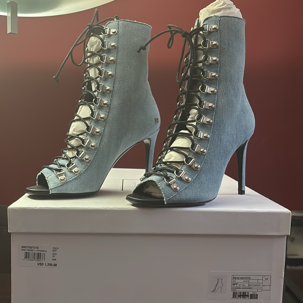 Balmain “off-bleu” denim booties.  Never worn.  Approximately 4-inch heels.